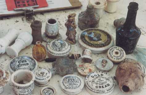 varied pot lids  miniature liquor and lids dolls heads glass and ceramic inks